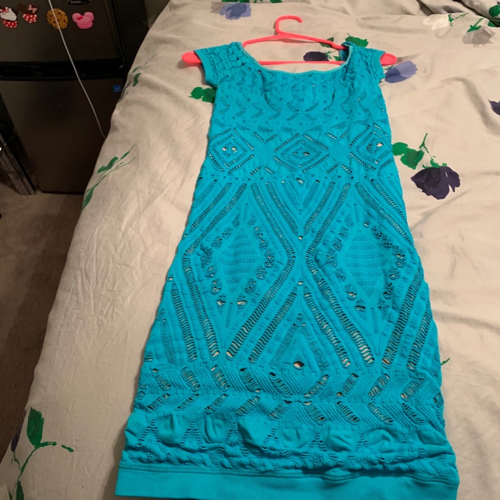 Ripped body con dress by Bebe